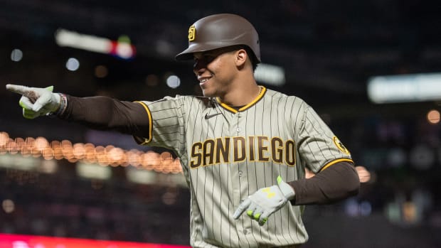 Sep 26, 2023; San Francisco, California, USA; San Diego Padres left fielder Juan Soto (22) points to hit team mates after hitting a home run during the seventh inning against the San Francisco Giants at Oracle Park.